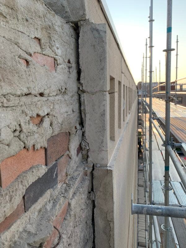 Heavy concrete panels are shown peeling away from the brick-and-mortar structure of the Great Falls Civic Center in this 2022 photo