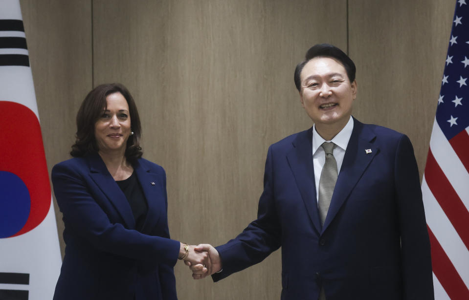 U.S. Vice President Kamala Harris, left, and South Korea's President Yoon Suk Yeol pose for a photo as they hold a bilateral meeting in Seoul Thursday, Sept. 29, 2022. (Leah Millis/Pool Photo via AP)