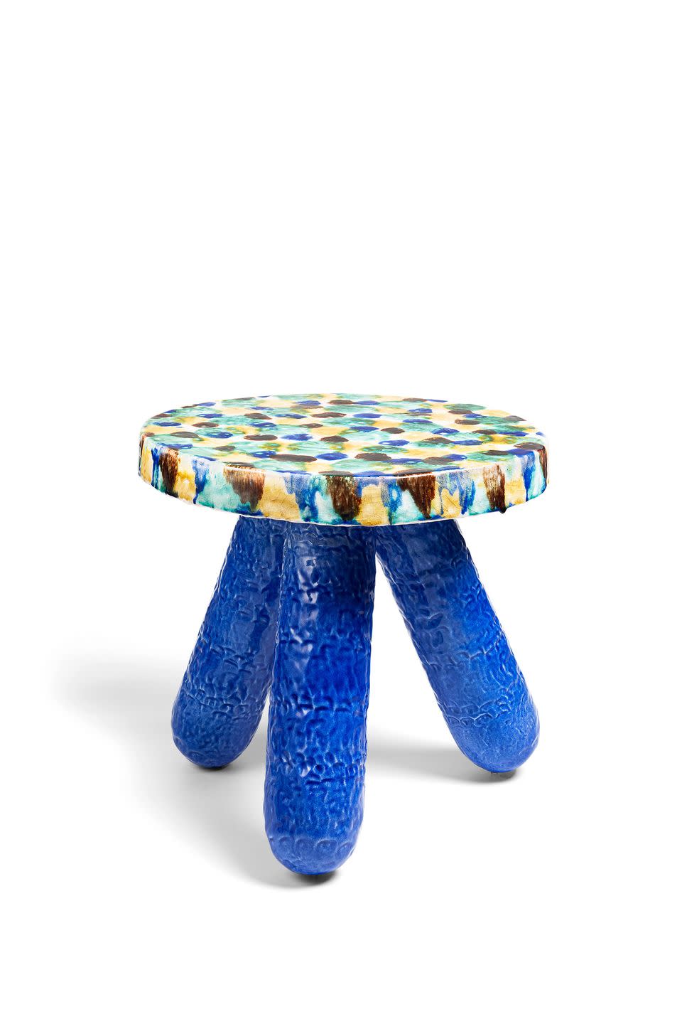 three leg table with blue painted legs with texture and a colorful top in watercolor smudges of yellow brown light green and light blue