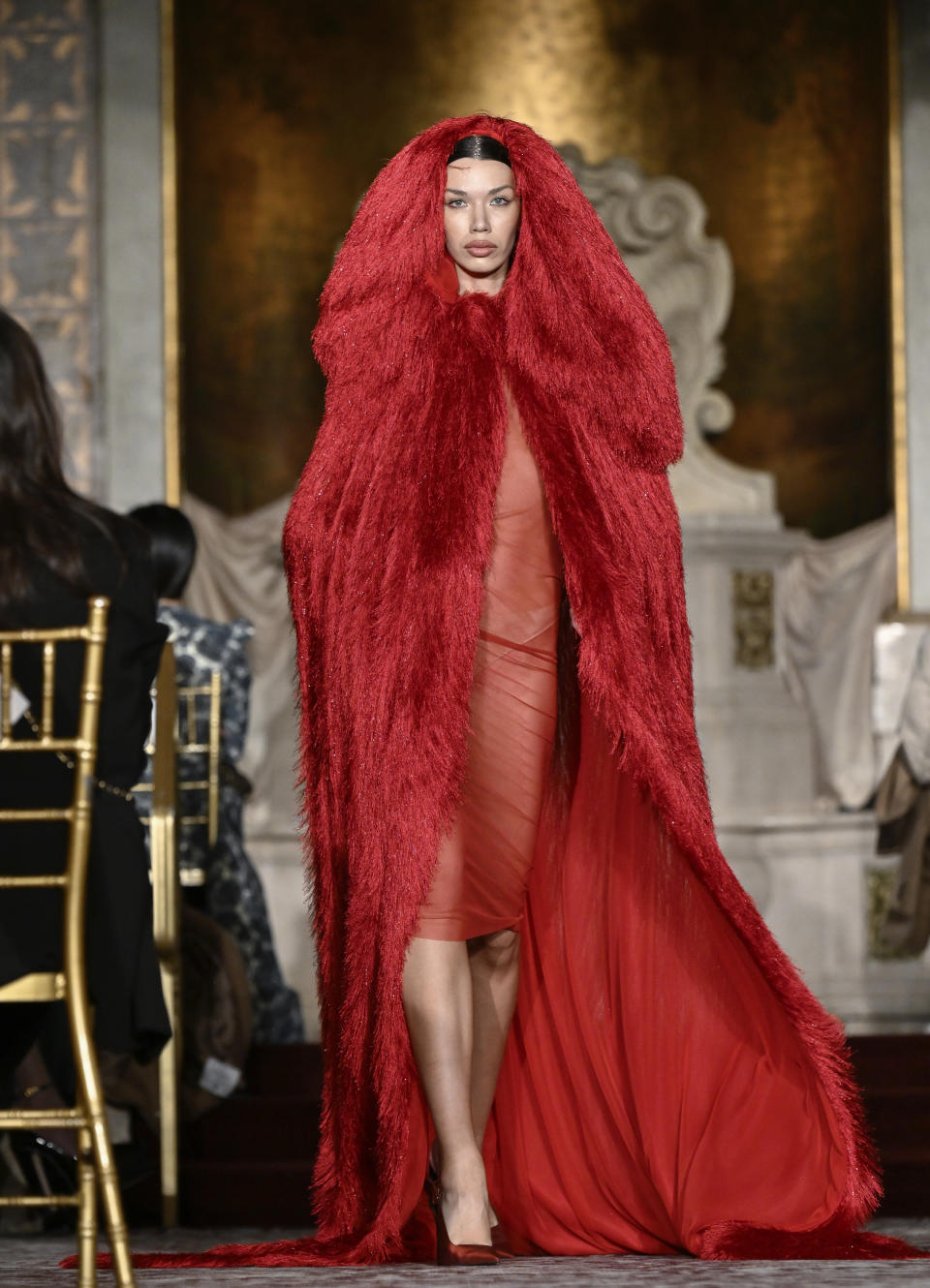 A model walks the runway during the Christian Siriano Fall/Winter 2024 fashion show at The Plaza Hotel during New York Fashion Week on Thursday, Feb. 8, 2024, in New York. (Photo by Evan Agostini/Invision/AP)