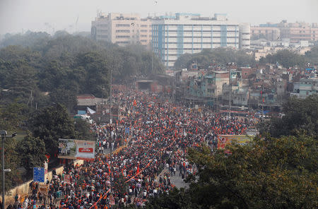 Supporters of the Vishva Hindu Parishad (VHP), a Hindu nationalist organisation, attend "Dharma Sabha" or a religious congregation organised by the VHP in New Delhi, India, December 9, 2018. REUTERS/Adnan Abidi