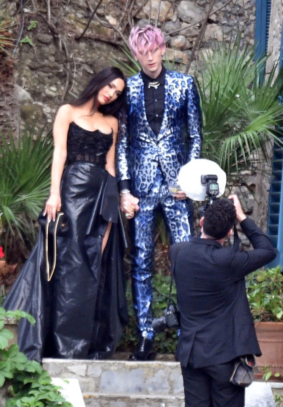 Portofino, ITALY - Guests and family attend Kourtney Kardashian and Travis Barker's wedding in Portofino.  Pictured: Megan Fox, MGK, Machine Gun Kelly BACKGRID USA 22 MAY 2022 BYLINE MUST READ: Cobra Team / BACKGRID USA: +1 310 798 9111 / usasales@backgrid.com UK: +44 208 344 2007 / uksales@backgrid.com * UK Clients - Pictures Containing Children Please Pixelate Face Prior To Publication *