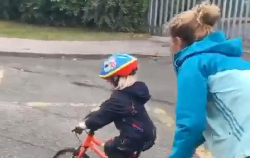 Kenny helps son Albert ride a bike - LAURANKENNY31 INSTAGRAM