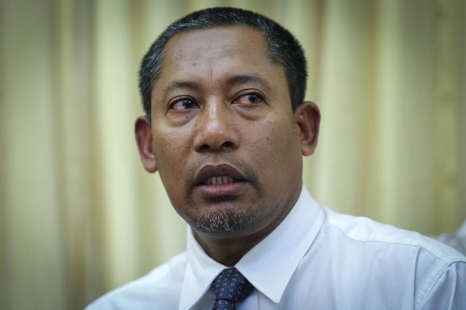 Gerakan Pembela Ummah chairman Mohd Zai Mustafa speaks during a press conference in Shah Alam September 24, 2020.