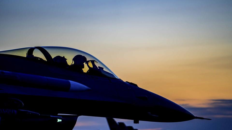 A 114th Fighter Wing F-16 Fighting Falcon waits to taxi for evening operations at Joe Foss Field, S.D., April 26. (Staff Sgt. Taylor Solberg/Air National Guard)