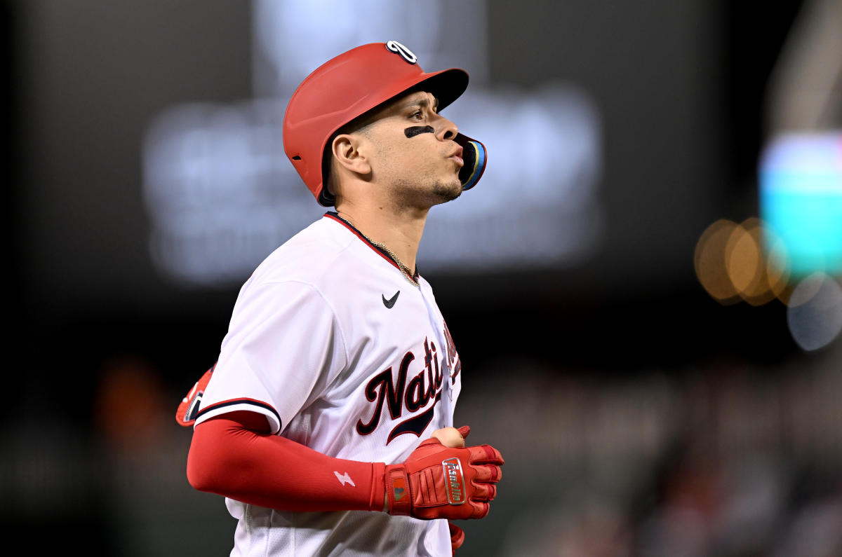 Joey Meneses of the Washington Nationals stands in the dugout