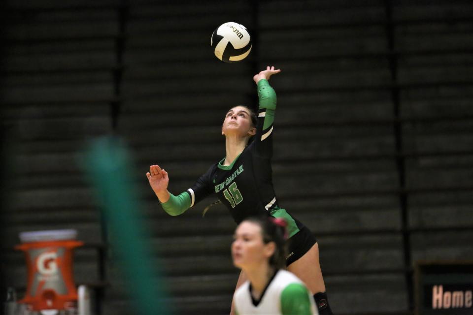 New Castle volleyball's Emily Grow serves in the team's sectional first round match against Delta at New Castle High School on Thursday, Oct. 13, 2022.