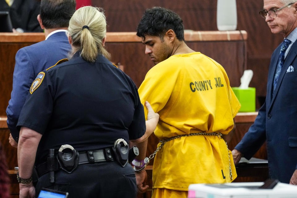 CORRECTS NAME: Johan Jose Martinez-Rangel, one of the two men accused of killing 12-year-old Jocelyn Nungaray, is led from the courtroom by deputies on Tuesday, June 25, 2024, in Houston. Capital murder charges have been filed against Martinez-Rangel and Franklin Jose Pena Ramos in the strangulation death of the 12-year-old. (Brett Coomer/Houston Chronicle via AP)