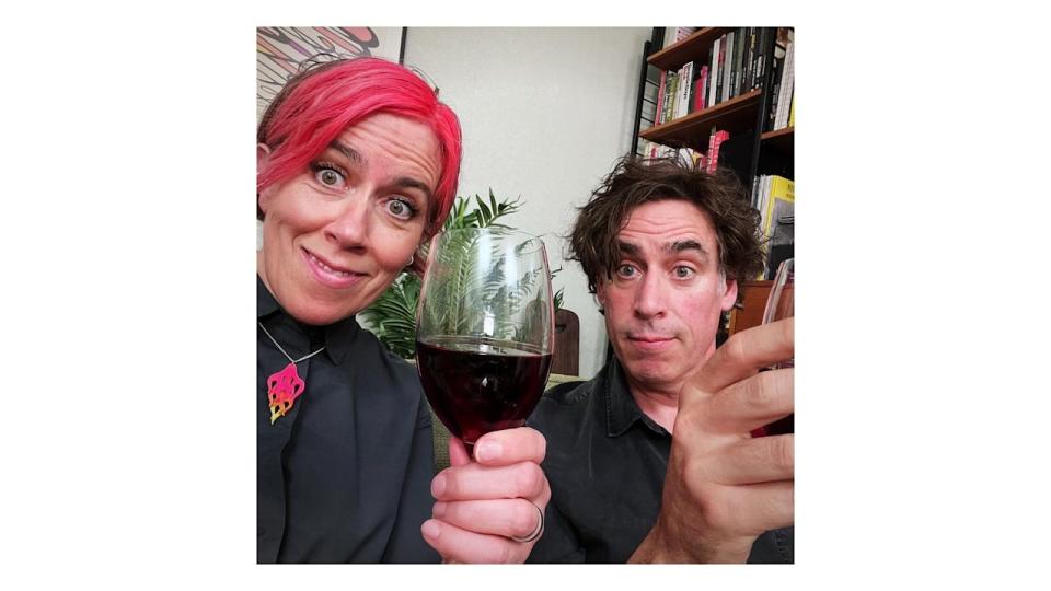 Stephen and anita mangan selfie with glasses of red wine