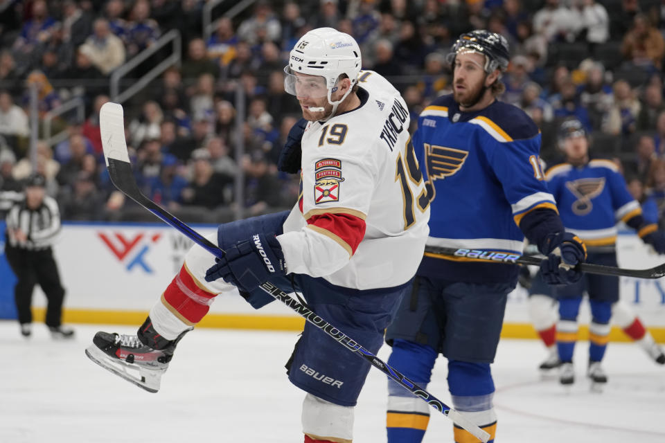 Florida Panthers' Matthew Tkachuk (19) celebrates after scoring as St. Louis Blues' Kevin Hayes, right, watches during the third period of an NHL hockey game Tuesday, Jan. 9, 2024, in St. Louis. (AP Photo/Jeff Roberson)