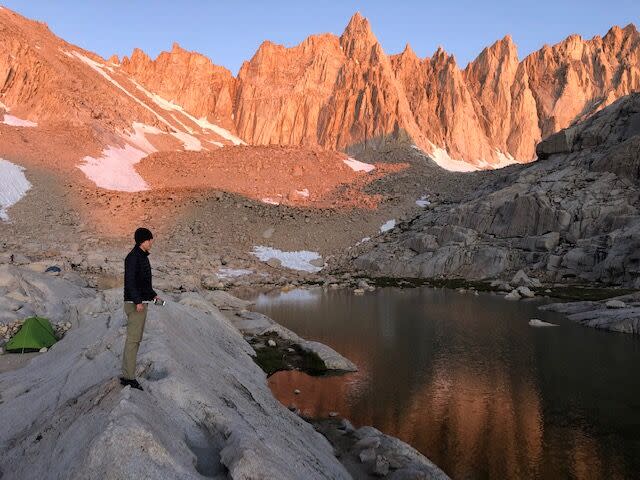 A hiker at Trail Camp just below the summit of Mt. Whitney.