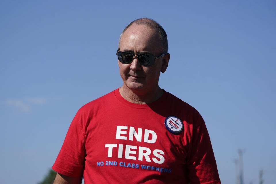 United Auto Workers President Shawn Fain walks in the Labor Day parade in Detroit, Monday, Sept. 4, 2023. (AP Photo/Paul Sancya)