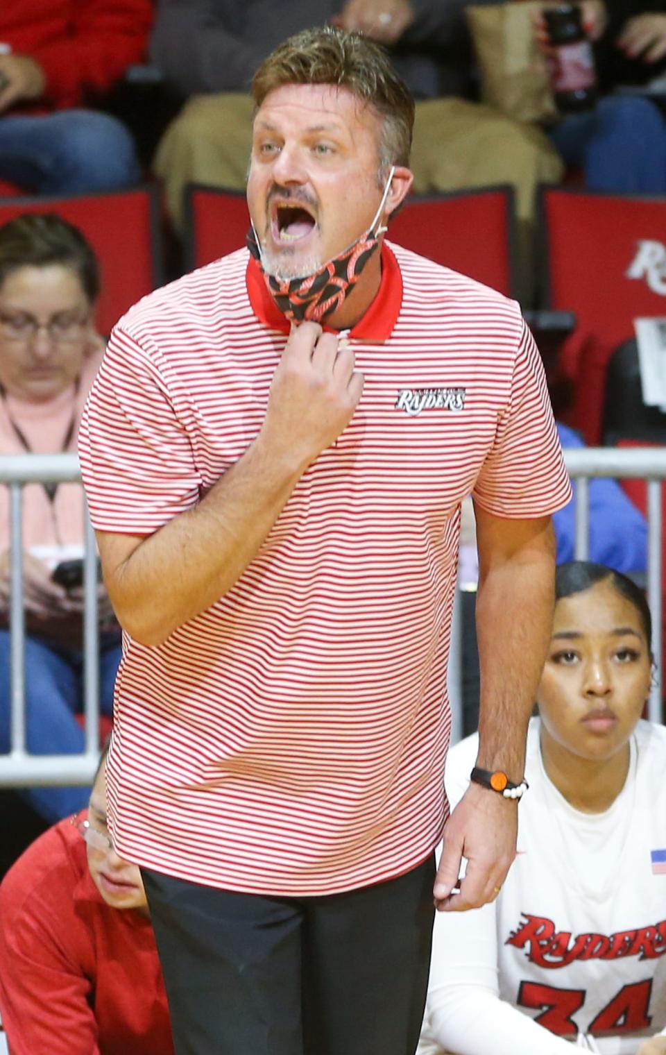 Northwest Florida State College basketball coach Bart Walker directs his team in a recent game at the Arena.