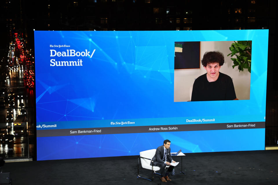 NEW YORK, NEW YORK - NOVEMBER 30: Andrew Ross Sorkin speaks with FTX founder Sam Bankman-Fried during the New York Times DealBook Summit in the Appel Room at the Jazz At Lincoln Center on November 30, 2022 in New York City. The New York Times held its first in-person DealBook Summit since the start of the coronavirus (COVID-19) pandemic with speakers from the worlds of financial services, technology, consumer goods, private investment, venture capital, banking, media, public relations, policy, government, and academia.   (Photo by Michael M. Santiago/Getty Images)