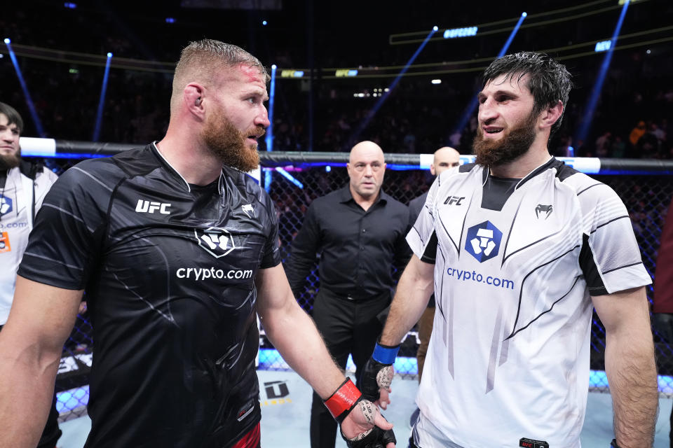 LAS VEGAS, NEVADA - DECEMBER 10: (L-R) Jan Blachowicz of Poland and Magomed Ankalaev of Russia react after their UFC light heavyweight championship fight resulted in a split draw during the UFC 282 event at T-Mobile Arena on December 10, 2022 in Las Vegas, Nevada. (Photo by Chris Unger/Zuffa LLC)