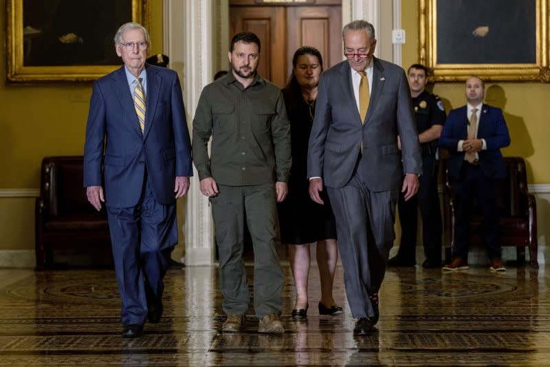 Senate minority leader Mitch McConnell (L), R-Ky., Ukrainian President Volodymyr Zelensky (C) and Senate majority leader Chuck Schumer, D-N.Y., head to a closed door meeting the US Capitol in Washington, D.C. on Sept. 21. On Wednesday, the Senate failed to advance legislation to fund Ukraine's defenses against Russia. File Photo by Tasos Katopodis/UPI