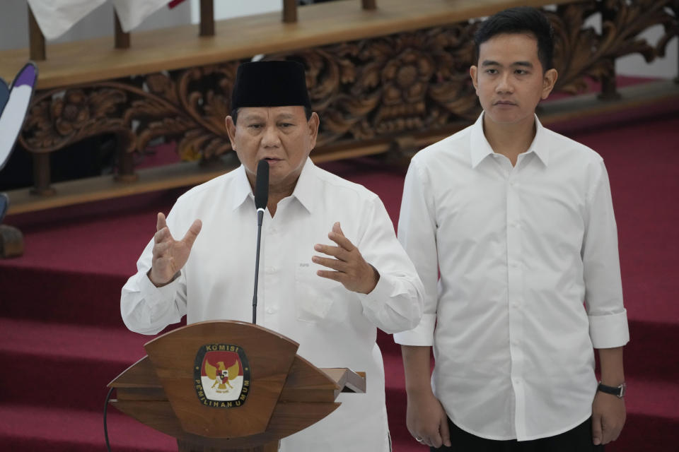 Indonesian Defense Minister and president-elect Prabowo Subianto, left, delivers a speech as his running mate Gibran Rakabuming Raka, the eldest son of Indonesian President JokoWidodo, listens during their formal declaration as president and vice president-elect at the General Election Commission building in Jakarta, Indonesia, Wednesday, April 24, 2024. Indonesia’s electoral commission formally declared Subianto as the elected president in a ceremony on Wednesday after the country’s highest court rejected appeals lodged by two losing presidential candidates who are challenging his landslide victory. (AP Photo/Dita Alangkara)