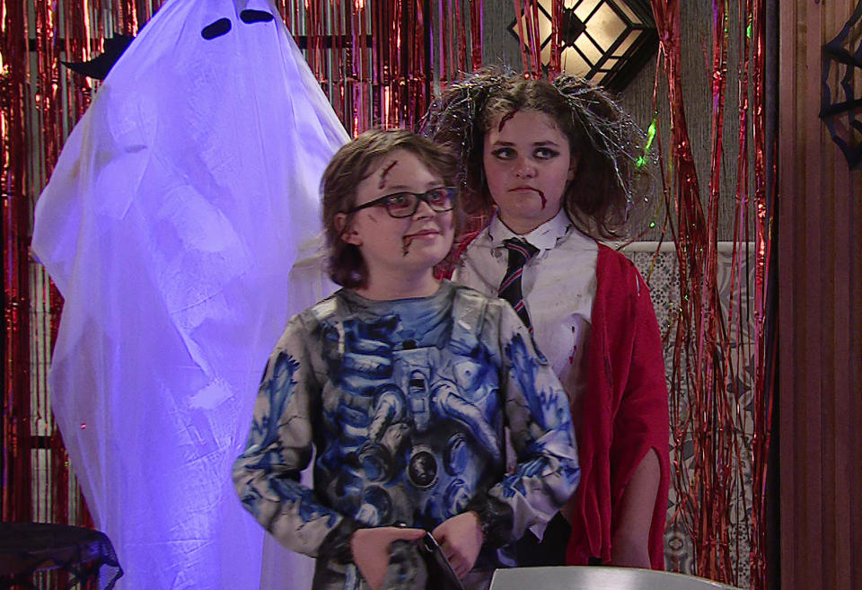 FROM ITV

STRICT EMBARGO - No Use Before Tuesday 24th October 2023

Coronation Street - Ep 1109798

Monday 30th October 2023

The Halloween party gets underway and Nick shows Sam Blakeman [JUDE RIORDAN] and Hope Stape [ISOBELLA FLANAGAN] to their table. 

Picture contact - David.crook@itv.com

This photograph is (C) ITV and can only be reproduced for editorial purposes directly in connection with the programme or event mentioned above, or ITV plc. This photograph must not be manipulated [excluding basic cropping] in a manner which alters the visual appearance of the person photographed deemed detrimental or inappropriate by ITV plc Picture Desk. This photograph must not be syndicated to any other company, publication or website, or permanently archived, without the express written permission of ITV Picture Desk. Full Terms and conditions are available on the website www.itv.com/presscentre/itvpictures/terms
