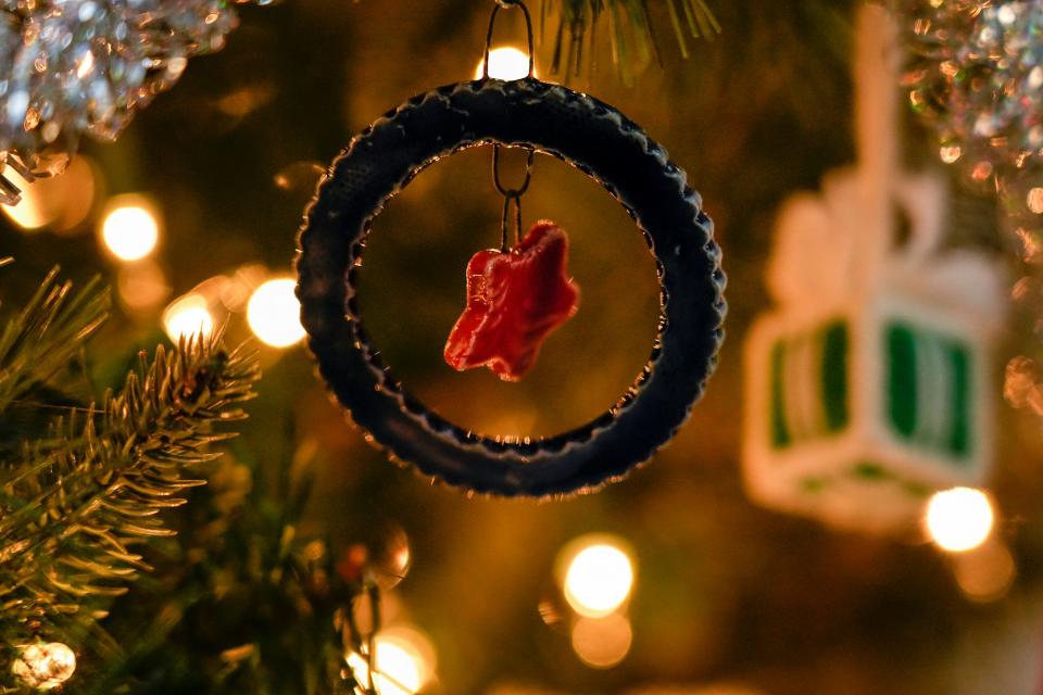 A handmade ornament by Diane Evans is seen on her Christmas tree. She likes to make cut-out ornaments with shapes in the center.