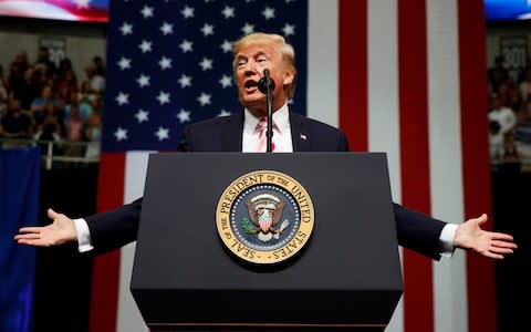 President Donald Trump speaks at a campaign rally for Sen. Luther Strange, in Huntsville, Alabama - Credit: AP Photo/Evan Vucci