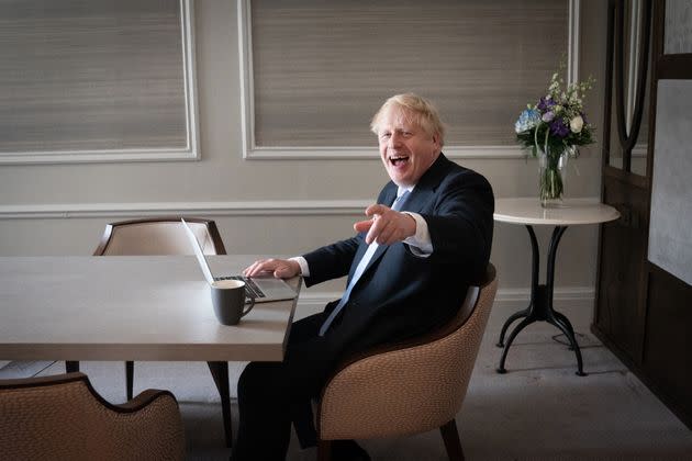 <strong>Boris Johnson prepares his keynote speech in his hotel room in Manchester before addressing the Conservative Party Conference on Wednesday.</strong> (Photo: Stefan RousseauPA)