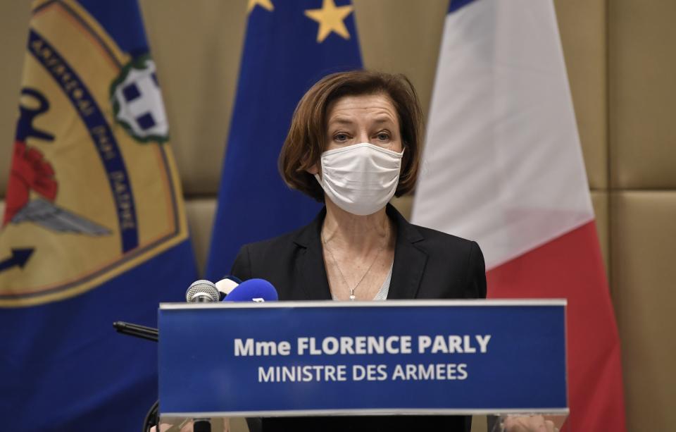 French Defense Minister Florence Parly makes a statement after signing the Rafale warplane deal in Athens, Monday, Jan. 25, 2021. Greece is due to sign a 2.3 billion euro ($2.8 billion) deal with France Monday to purchase 18 Rafale fighter jets to address tension with neighbor Turkey. (Louisa Gouliamaki/Pool via AP)