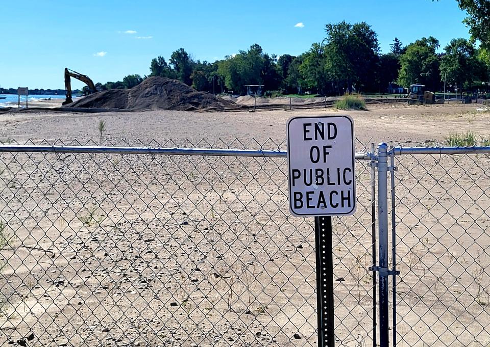 Dredging is underway on Thursday, Aug. 31, 2023, at the Black River Canal in view from the Kraft Road beach.