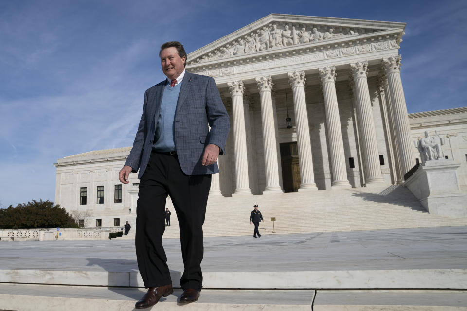 Mitch Hungerpiller of Birmingham, Ala., who invented a computerized system to automate the processing of returned mail, visits the Supreme Court in Washington, on Feb. 14, 2019, where his decade-long fight with the post office over patent infringement will be heard. (AP Photo/J. Scott Applewhite)