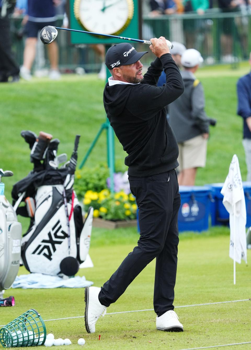 Michael Block hits a shot on the driving range during a practice round for the 2024 PGA Championship at Valhalla Golf Club.