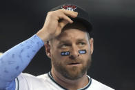 Arizona Diamondbacks' Stephen Vogt watches the action in the sixth inning during a baseball game against the Los Angeles Dodgers, Sunday, June 20, 2021, in Phoenix. (AP Photo/Rick Scuteri)