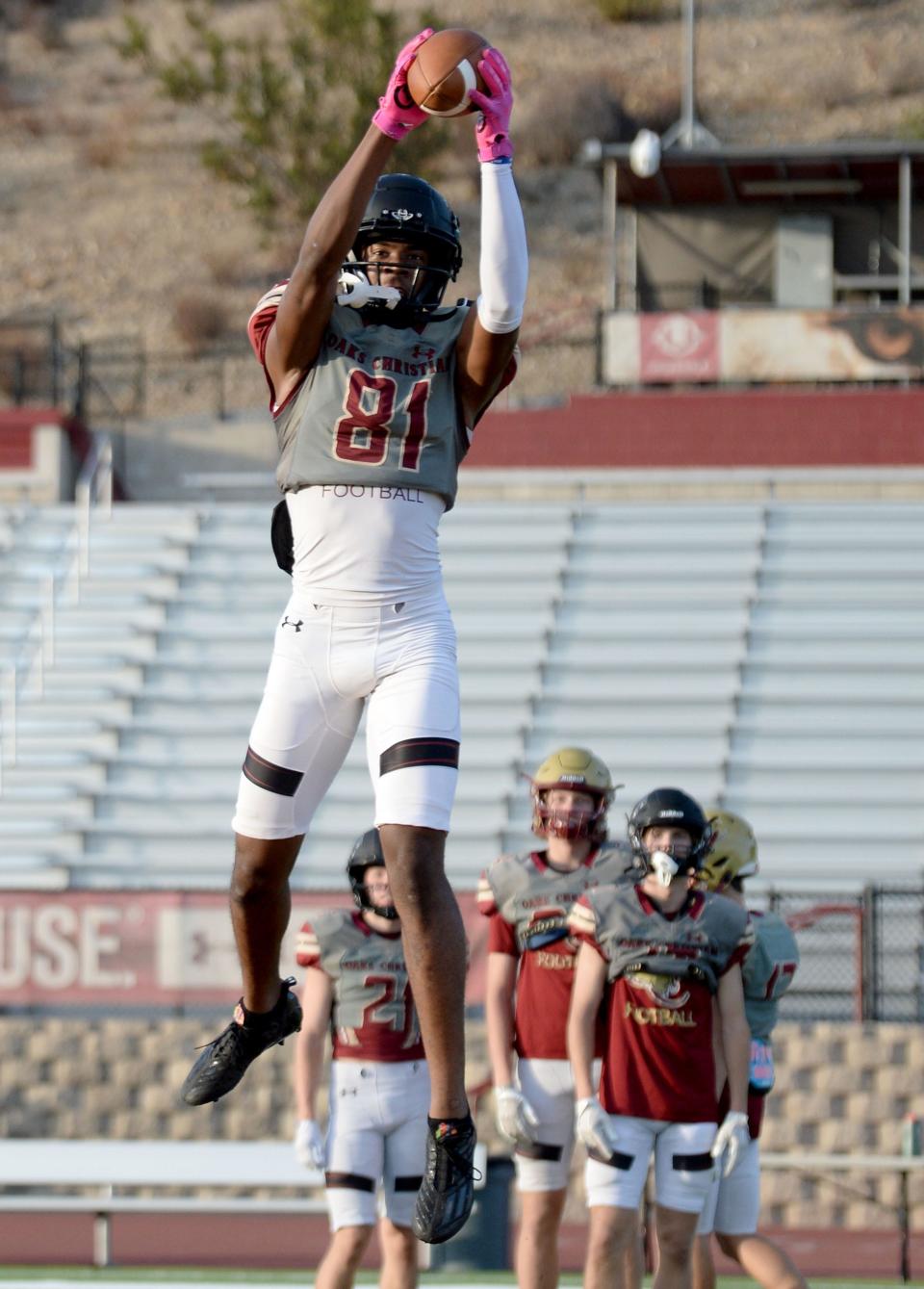 Wide receiver Justice Williams soars to make a catch during an Oaks Christian football team practice on Tuesday, Oct. 11, 2022. The Lions, who are 5-2 overall and 1-0 in the Marmonte League, host rival Westlake on Friday night.