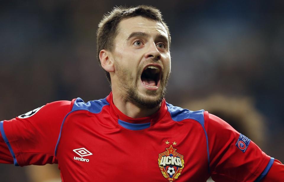 CSKA defender Georgi Schennikov celebrates after scoring his side's second goal during the Champions League, Group G soccer match between Real Madrid and CSKA Moscow, at the Santiago Bernabeu stadium in Madrid, Spain, Wednesday Dec. 12, 2018. (AP Photo/Paul White)