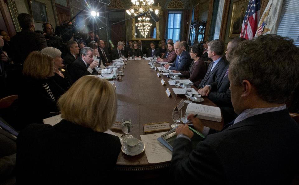 Vice President Joe Biden, right, meets with members of the Cabinet in the Old Executive Office Building on the White House campus in Washington,Thursday, Feb. 20, 2014. Biden discussed ways to identify job skills that match the demands of American companies. (AP Photo/Pablo Martinez Monsivais)