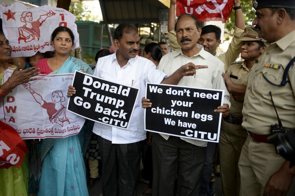 Activist of the Centre of Indian Trade Unions (CITU) hold placards and shout slogans during a protest against US President Donald Trump's visit to India in Hyderabad on February 24, 2020. (Photo by NOAH SEELAM / AFP) (Photo by NOAH SEELAM/AFP via Getty Images)