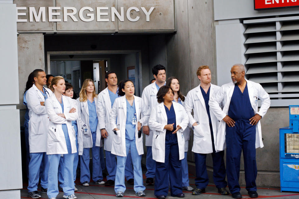 the assembled doctors of Grey's Anatomy out the front of the hospital's emergency department