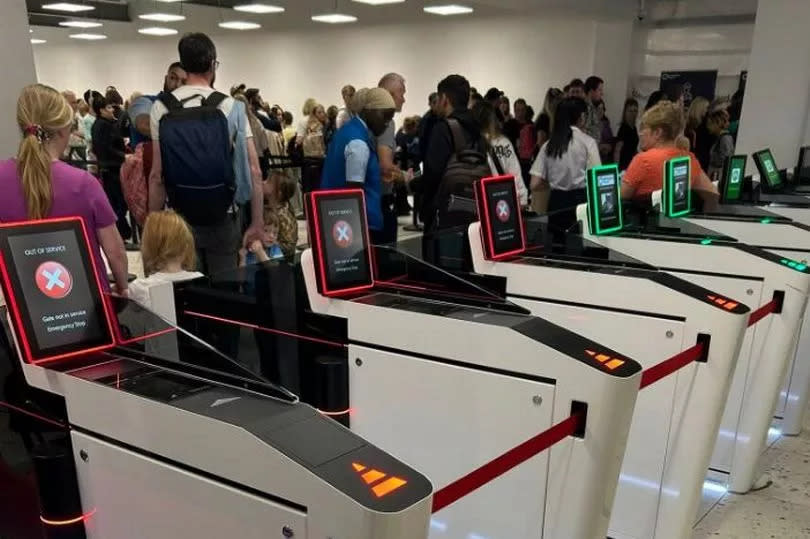 Out of order: Boarding pass scanners have been cordoned off adding to delays -Credit:Paul Beadle