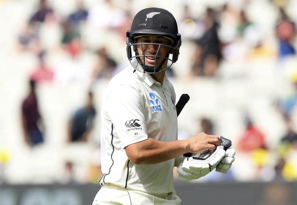 New Zealand's Ross Taylor walks off the field after being dismissed by Australia during their cricket test match in Melbourne, Australia, Saturday, Dec. 28, 2019. (AP Photo/Andy Brownbill)