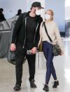 <p>Groom- and bride-to-be Tarek El Moussa and Heather Rae Young depart LAX hand-in-hand on Thursday.</p>