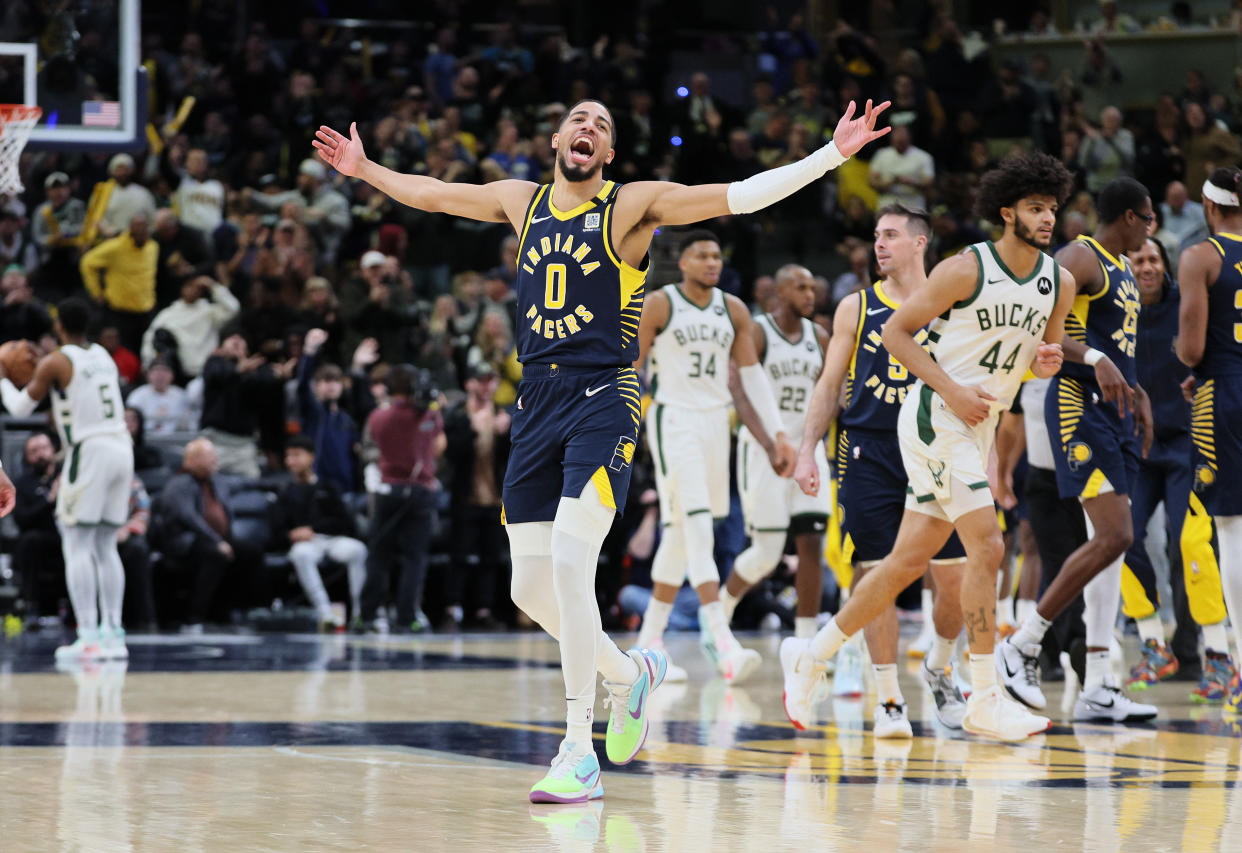 INDIANAPOLIS, INDIANA - JANUARY 03: Tyrese Haliburton #0 of the Indiana Pacers celebrates in the fourth quarter of the 142-130 win against the Milwaukee Bucks at Gainbridge Fieldhouse on January 03, 2024 in Indianapolis, Indiana.    NOTE TO USER: User expressly acknowledges and agrees that, by downloading and or using this photograph, User is consenting to the terms and conditions of the Getty Images License Agreement.  (Photo by Andy Lyons/Getty Images)