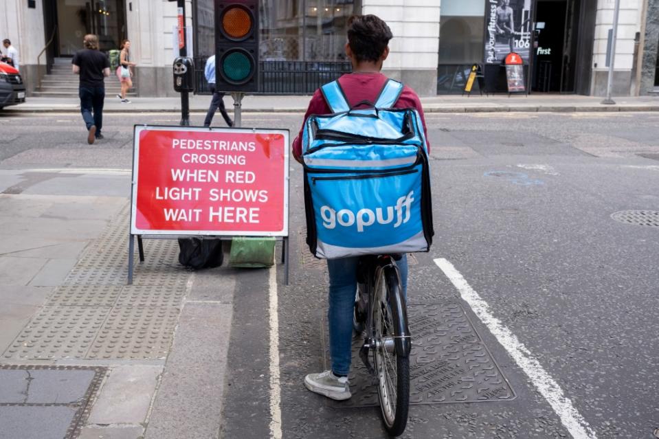 Groceries and food delivery brand Gopuff cycle courier on 15th August 2023 in London, United Kingdom. Gopuff is a United States based consumer goods and food delivery company headquartered in Philadelphia. It also operates in the United Kingdom, following a take over of Fancy. Gig workers are independent contractors, online platform workers, contract firm workers, on-call workers and temporary workers. Gig workers enter into formal agreements with on-demand companies to provide services to the companys clients. (photo by Mike Kemp/In Pictures via Getty Images)
