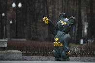 A monument to Misha the Bear, the mascot of the Moscow 1980 Olympic Games, in a park in Moscow, Russia, Monday, Dec. 9, 2019. The World Anti-Doping Agency has banned Russia from the Olympics and other major sporting events for four years, though many athletes will likely be allowed to compete as neutral athletes. (AP Photo/Pavel Golovkin)