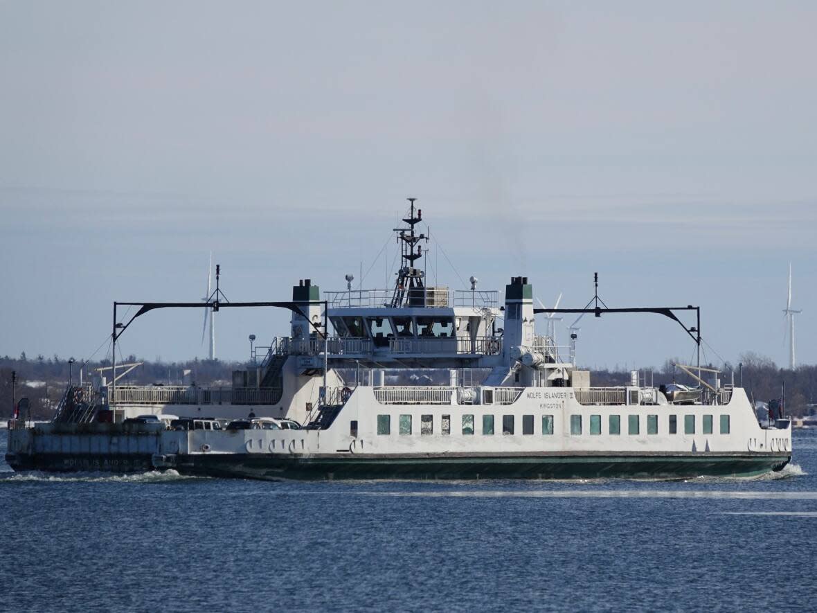 The Wolfe Islander III is shown leaving Kingston, Ont., on Jan. 31, 2023. The decades-old ferry is set to be joined by a new electric model this spring, much to the relief of the roughly 1,400 residents that call Wolfe Island home. (Dan Taekema/CBC - image credit)