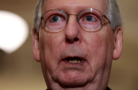 FILE PHOTO: U.S. Senate Majority Leader Mitch McConnell (R-KY) speaks to reporters in Washington, U.S., December 11, 2018. REUTERS/Jim Young/File Photo