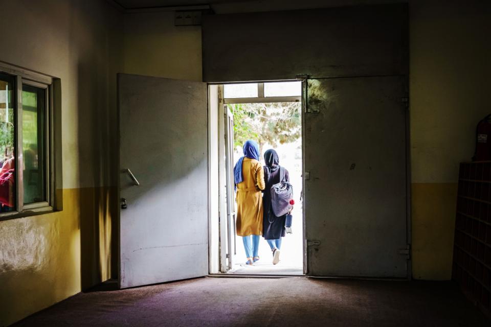 Girls leaving an orchestra rehearsal