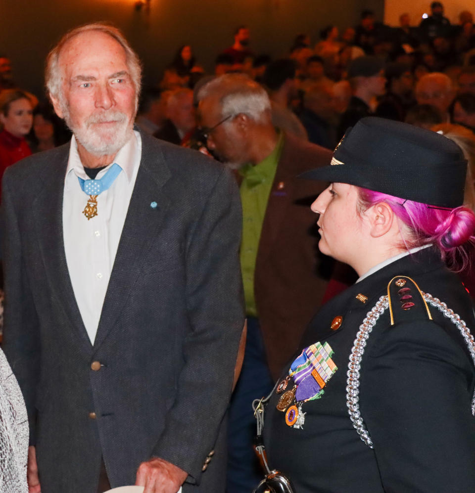 Pueblo Medal of Honor recipient Drew Dix, left, at pueblo School District 60's Pride and Patriotism event Thursday, Nov. 10.