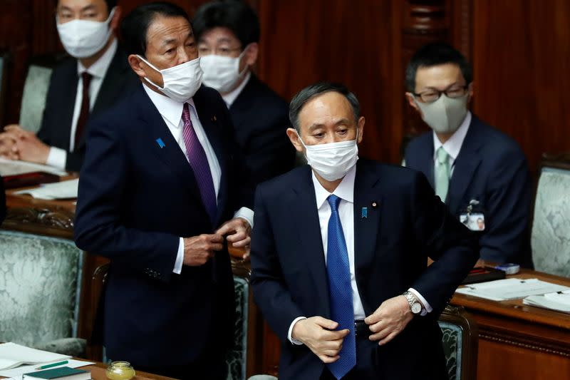 Japan's Prime Minister Yoshihide Suga delivers his policy speech at the opening of the Lower House parliamentary session in Tokyo