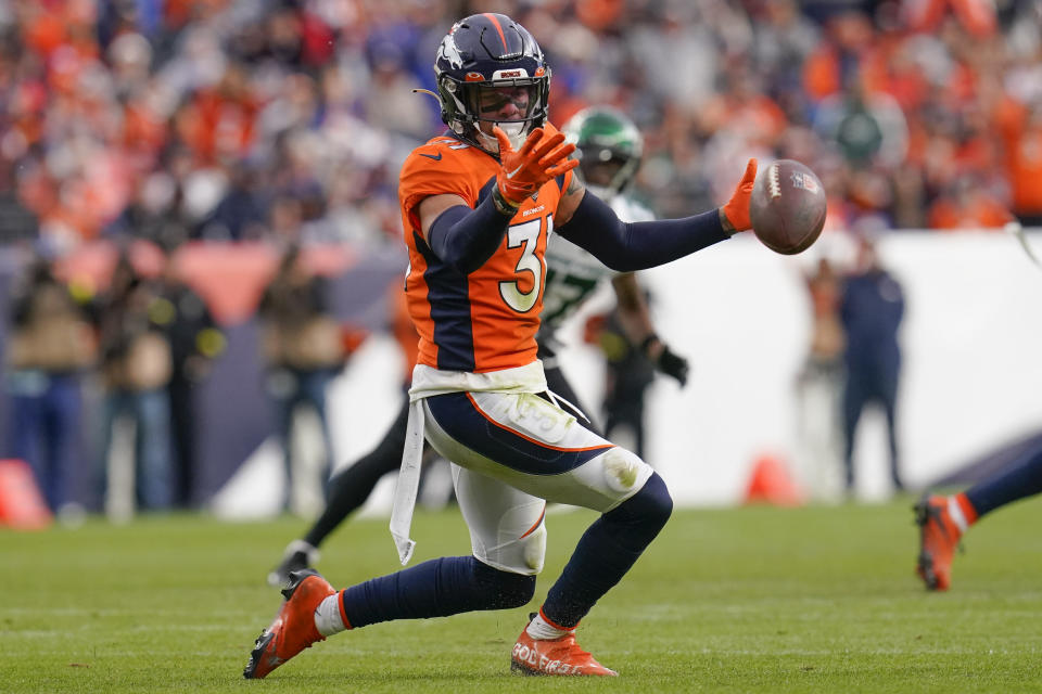 Denver Broncos safety Justin Simmons (31) misses an interception against the New York Jets during the second half of an NFL football game, Sunday, Oct. 23, 2022, in Denver. (AP Photo/Matt York)