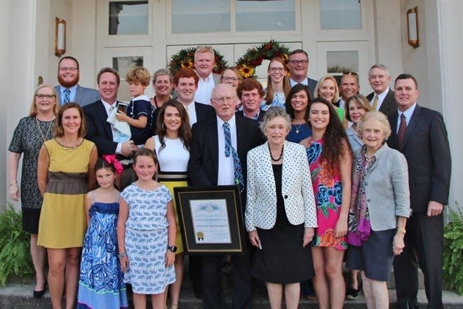 The Murdaugh family in 2018, when Randolph III was presented the Order of the Palmetto. The late Libby Murdaugh is pictured at front center, beside her husband holding the Order of the Palmetto.