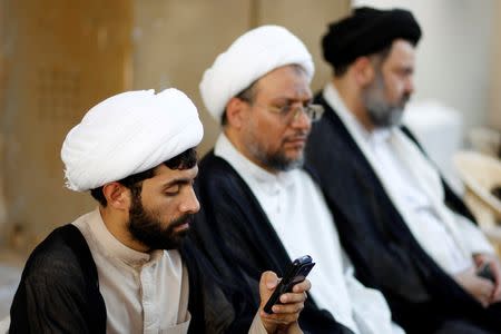 Shi'ite clerics are seen during a sit-in outside Bahrain's leading Shi'ite cleric Isa Qassim in the village of Diraz west of Manama, Bahrain June 21, 2016. Bahrain has stripped Qassim of his citizenship, state news agency BNA reported on Monday. REUTERS/Hamad I Mohammed