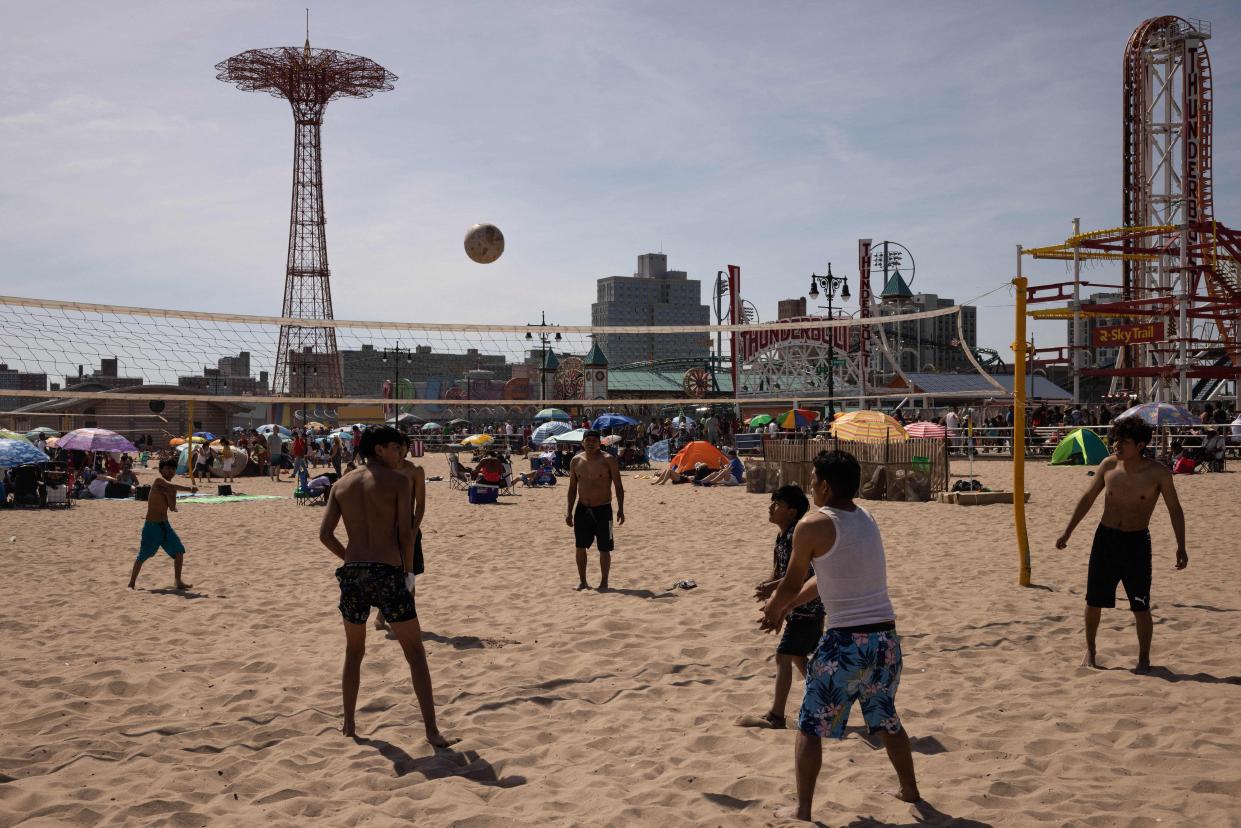 Beachgoers at the Coney Island Beach in Brooklyn, New York.